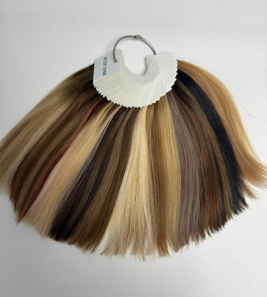 QOGH colour ring with real hair swatches in every shade fanned on a metal ring
