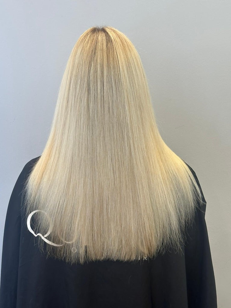 Before hair extensions — back view